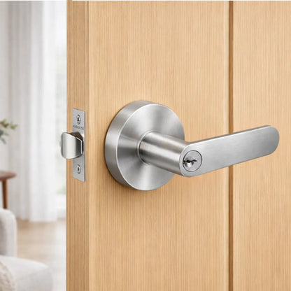 Manija Línea Bella Para Puerta Interior O Exterior Con Llave Acero Plateado