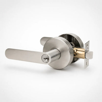Manija Línea Bella Para Puerta Interior O Exterior Con Llave Acero Plateado