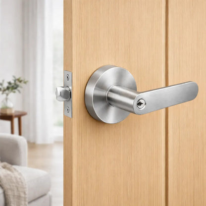 Manija Línea Bella Para Puerta Interior O Exterior Con Llave Acero Plateado